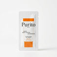 A single-use sunscreen sample sachet from Purito Seoul, featuring a white textured foil pouch with orange accents and black text, set against a clean white background.